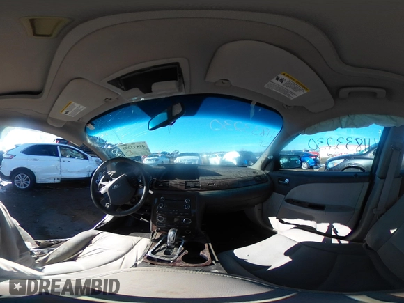2009 Ford Taurus SEL with VIN 1FAHP24W79G106500, listed as a IAAI auction lot 41833230 with 133,055 mi miles. Bid and sale history available at carsss.com. Image 19.