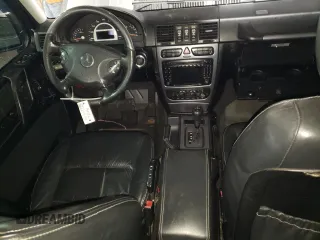 2005 Mercedes-Benz G with VIN WDCYR71E65X160243, listed as a Copart auction lot 48140075 with 164,457 mi miles and Salvage Title. Bid and sale history available at DreamBid. Image 8.
