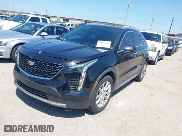 2019 Cadillac XT4 FWD Premium Luxury z VIN 1GYFZCR48KF141478, wystawiony jako IAAI lot #41988092 z przebiegiem 53 970 mil mil oraz . Historia ofert i sprzedaży dostępna na DreamBid. Obrazek 2.
