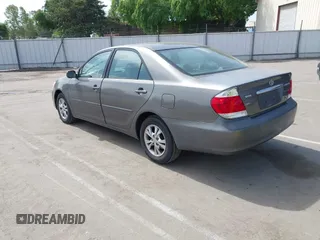 2005 Toyota Camry LE with VIN 4T1BF32K35U590150, listed as a IAAI auction lot 42053337 with 180,627 mi miles and . Bid and sale history available at DreamBid. Image 3.