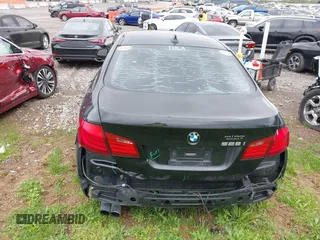 2012 BMW 5 Series 528i with VIN WBAXG5C5XCDX01864, listed as a IAAI auction lot 41910337 with 200,110 mi miles. Bid and sale history available at carsss.com. Image 6.