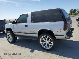 1997 Chevrolet Tahoe z VIN 3GNEK18R1VG112163, wystawiony jako Copart lot #58631925 z przebiegiem 213 262 mil mil oraz Tytuł czysty. Historia ofert i sprzedaży dostępna na DreamBid. Obrazek 2.