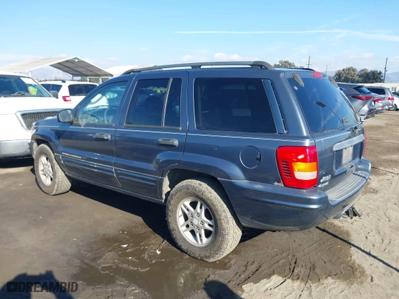 2002 Jeep Grand Cherokee Laredo with VIN 1J4GW48N72C261741, listed as a IAAI auction lot 40972222 with 174,516 mi miles. Bid and sale history available at carsss.com. Image 3.
