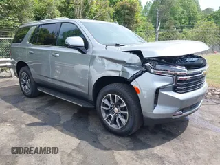 2024 Chevrolet Tahoe LT z VIN 1GNSKNKD1RR317799, wystawiony jako IAAI lot #42169388 z przebiegiem 9 131 mil mil oraz . Historia ofert i sprzedaży dostępna na DreamBid. Obrazek 1.
