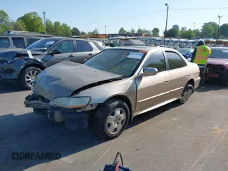 2002 Honda Accord EX z VIN 1HGCG16572A033397, wystawiony jako IAAI lot #42055022 z przebiegiem 225 073 mil mil oraz . Historia ofert i sprzedaży dostępna na DreamBid. Obrazek 2.