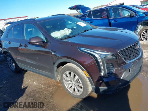 2020 Cadillac XT4 FWD Sport z VIN 1GYFZER40LF144503, wystawiony jako IAAI lot #41265649 z przebiegiem 79 120 mil mil oraz . Historia ofert i sprzedaży dostępna na DreamBid. Obrazek 1.