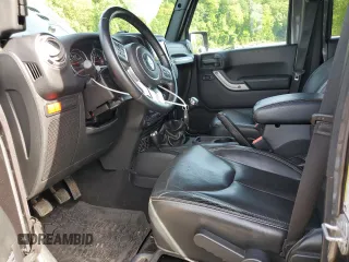 2016 Jeep Wrangler Unlimited Rubicon with VIN 1C4BJWFG4GL252209, listed as a Copart auction lot 58525725 with 46,604 mi miles and Salvage title. Bid and sale history available at DreamBid. Image 7.