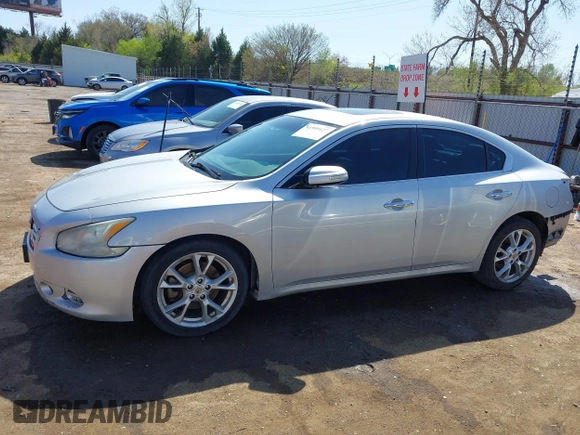 2013 Nissan Maxima SV with VIN 1N4AA5AP4DC828945, listed as a IAAI auction lot 41995127 with 169,754 mi miles and . Bid and sale history available at DreamBid. Image 14.