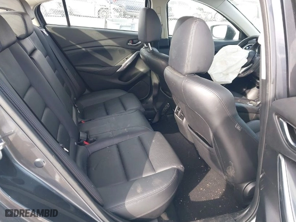 2016 Mazda Mazda6 i Touring with VIN JM1GJ1V50G1482656, listed as a IAAI auction lot 41582156 with 99,756 mi miles. Bid and sale history available at carsss.com. Image 8.