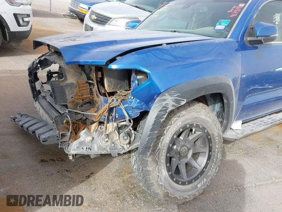 2018 Toyota Tacoma SR with VIN 3TMCZ5AN1JM124111, listed as a IAAI auction lot 41741973 with 90,175 mi miles. Bid and sale history available at carsss.com. Image 12.