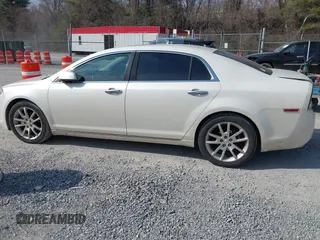 2011 Chevrolet Malibu LTZ with VIN 1G1ZE5E76BF201423, listed as a IAAI auction lot 41781995 with 144,428 mi miles and . Bid and sale history available at DreamBid. Image 14.