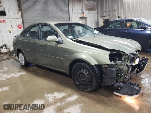 2004 Suzuki Forenza S z VIN KL5JD52Z14K975804, wystawiony jako Copart lot #43227455 z przebiegiem 114 726 mil mil oraz Szkody całkowita. Historia ofert i sprzedaży dostępna na DreamBid. Obrazek 4.