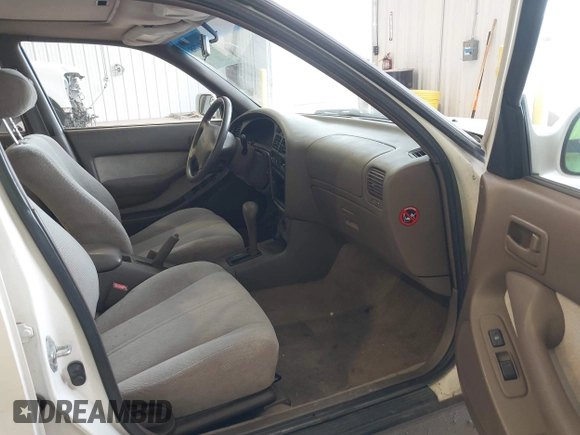 1996 Toyota Camry DX with VIN JT2BG12K3T0401659, listed as a IAAI auction lot 41874795 with 169,406 mi miles. Bid and sale history available at carsss.com. Image 5.