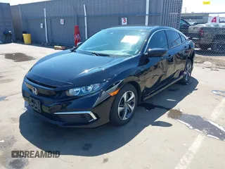 2019 Honda Civic Sedan LX with VIN 19XFC2F61KE202252, listed as a IAAI auction lot 42139362 with 37,128 mi miles. Bid and sale history available at carsss.com. Image 2.