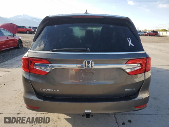 2018 Honda Odyssey Touring с VIN 5FNRL6H8XJB076145, выставлен на аукционе Copart как лот 51870865 с пробегом 96 486 миль миль и Списание • Salvage title. История ставок и продаж доступна на DreamBid. Изображение 6.