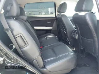 2015 Mazda CX-9 Grand Touring z VIN JM3TB2DA4F0450014, wystawiony jako IAAI lot #41692935 z przebiegiem 90 800 mil mil oraz . Historia ofert i sprzedaży dostępna na DreamBid. Obrazek 8.