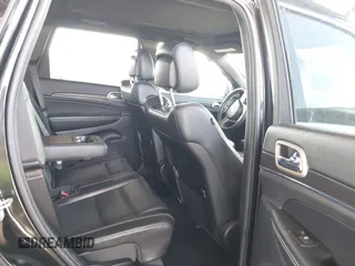 2014 Jeep Grand Cherokee Limited z VIN 1C4RJFBM9EC409093, wystawiony jako IAAI lot #42255242 z przebiegiem 121 059 mil mil oraz . Historia ofert i sprzedaży dostępna na DreamBid. Obrazek 8.