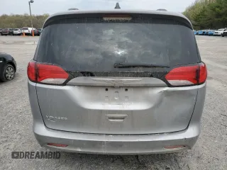 2021 Chrysler Voyager LXi with VIN 2C4RC1DG0MR521145, listed as a Copart auction lot 48062405 with 144,197 mi miles and Salvage Title. Bid and sale history available at DreamBid. Image 6.