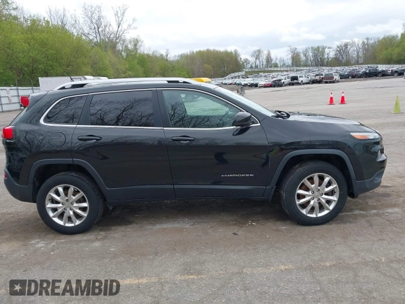 2015 Jeep Cherokee Limited with VIN 1C4PJMDB9FW680565, listed as a IAAI auction lot 42134052 with 192,728 mi miles. Bid and sale history available at carsss.com. Image 13.