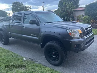 2013 Toyota Tacoma with VIN 3TMMU4FN4DM055828, listed as a Copart auction lot 64141565 with 180,442 mi miles and Clean title. Bid and sale history available at DreamBid. Image 1.