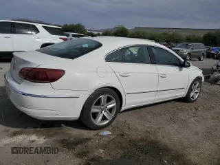 2013 Volkswagen CC Sport with VIN WVWBP7AN9DE567212, listed as a Copart auction lot 52998835 with 127,255 mi miles and Salvage Title. Bid and sale history available at carsss.com. Image 3.