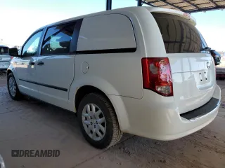 2014 Ram Cargo Van Tradesman with VIN 2C4JRGAG8ER458865, listed as a Copart auction lot 88217565 with 183,464 mi miles and Salvage Title. Bid and sale history available at carsss.com. Image 2.