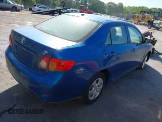 2010 Toyota Corolla with VIN 1NXBU4EE1AZ334617, listed as a IAAI auction lot 42177912 with 131,841 mi miles. Bid and sale history available at carsss.com. Image 4.