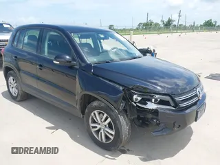 2014 Volkswagen Tiguan SE with VIN WVGAV3AX7EW549326, listed as a IAAI auction lot 42515906 with 102,221 mi miles and . Bid and sale history available at DreamBid. Image 1.