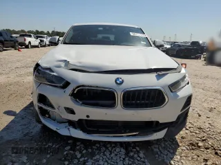 2023 BMW X2 sDrive28i with VIN WBXYH9C00P5V38984, listed as a Copart auction lot 50739725 with 47,287 mi miles and Salvage Title. Bid and sale history available at carsss.com. Image 5.