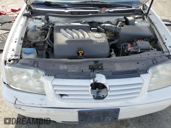 2002 Volkswagen Jetta GL с VIN 3VWRK69M52M024396, выставлен на аукционе Copart как лот 45539355 с пробегом 142 880 миль миль и Списание • Salvage title. История ставок и продаж доступна на DreamBid. Изображение 13.