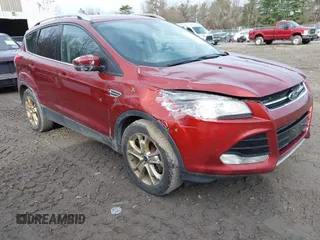 2015 Ford Escape Titanium with VIN 1FMCU9JX1FUA56091, listed as a IAAI auction lot 41947035 with 191,297 mi miles and . Bid and sale history available at DreamBid. Image 1.