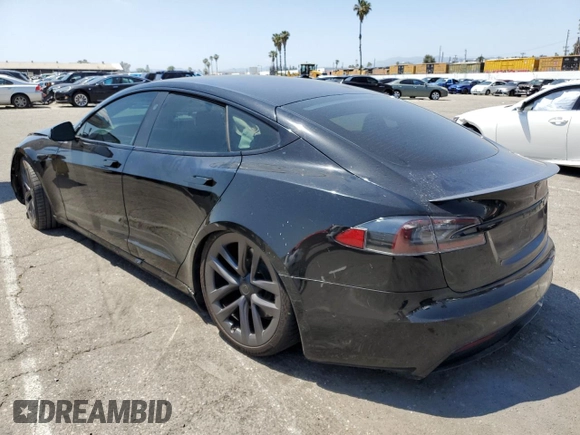 2022 Tesla Model S Plaid z VIN 5YJSA1E62NF471696, wystawiony jako Copart lot #56249555 z przebiegiem Nie podano mil oraz Szkoda całkowita • Salvage title. Historia ofert i sprzedaży dostępna na DreamBid. Obrazek 2.