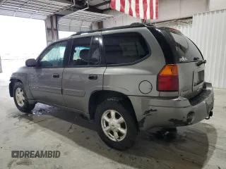 2005 GMC Envoy SLE с VIN 1GKDS13S752274178, выставлен на аукционе Copart как лот 55289005 с пробегом 199 378 миль миль и Списание • Salvage title. История ставок и продаж доступна на DreamBid. Изображение 2.