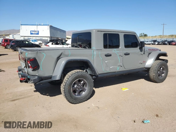 2022 Jeep Gladiator Rubicon z VIN 1C6JJTBG9NL101774, wystawiony jako Copart lot #74597074 z przebiegiem 11 903 mil mil oraz Szkoda całkowita • Salvage title. Historia ofert i sprzedaży dostępna na DreamBid. Obrazek 3.