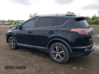 2018 Toyota RAV4 XLE with VIN 2T3WFREV0JW484430, listed as a Copart auction lot 55878455 with 132,335 mi miles and Salvage title. Bid and sale history available at DreamBid. Image 2.