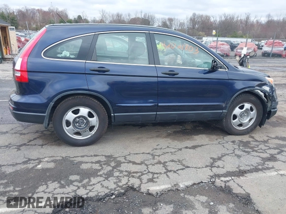 2011 Honda CR-V LX with VIN JHLRE4H38BC029698, listed as a IAAI auction lot 42021803 with 92,071 mi miles. Bid and sale history available at carsss.com. Image 13.