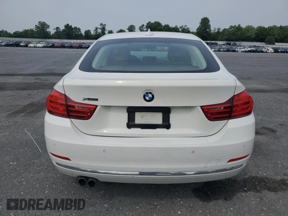 2015 BMW 4 Series 428i xDrive с VIN WBA4C9C52FD330306, выставлен на аукционе Copart как лот 60834435 с пробегом 167 034 миль миль и Списание • Salvage title. История ставок и продаж доступна на DreamBid. Изображение 6.