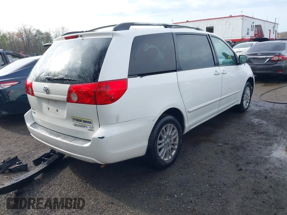 2008 Toyota Sienna LE with VIN 5TDBK23C28S010610, listed as a IAAI auction lot 41944472 with 149,223 mi miles. Bid and sale history available at carsss.com. Image 4.