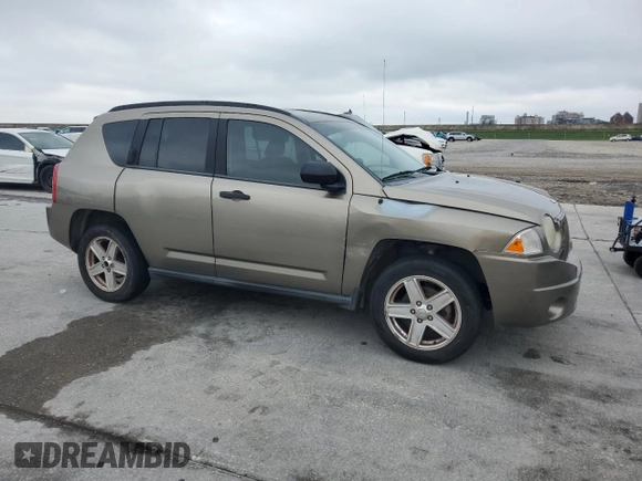 2007 Jeep Compass Sport with VIN 1J8FT47W17D205650, listed as a Copart auction lot 51174585 with 215,473 mi miles and Salvage Title. Bid and sale history available at carsss.com. Image 4.