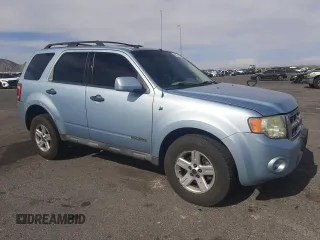 2008 Ford Escape Hybrid with VIN 1FMCU49HX8KE02136, listed as a Copart auction lot 58233195 with 205,532 mi miles and Salvage title. Bid and sale history available at DreamBid. Image 4.