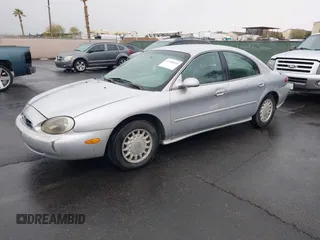 1997 Mercury Sable GS z VIN 1MELM50U8VG603194, wystawiony jako IAAI lot #41558010 z przebiegiem 265 169 mil mil oraz . Historia ofert i sprzedaży dostępna na DreamBid. Obrazek 2.