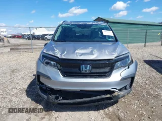 2021 Honda Pilot Special Edition with VIN 5FNYF6H20MB066095, listed as a IAAI auction lot 41863123 with 65,930 mi miles. Bid and sale history available at carsss.com. Image 12.