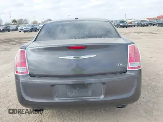 2013 Chrysler 300 with VIN 2C3CCABG7DH611105, listed as a IAAI auction lot 41769860 with 186,476 mi miles. Bid and sale history available at carsss.com. Image 16.