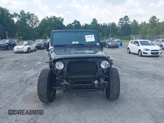 2017 Jeep Wrangler Sport z VIN 1C4AJWAG0HL618140, wystawiony jako IAAI lot #42582104 z przebiegiem 77 883 mil mil oraz . Historia ofert i sprzedaży dostępna na DreamBid. Obrazek 13.