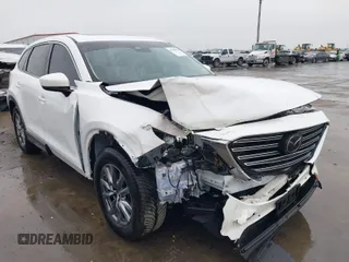 2019 Mazda CX-9 Touring with VIN JM3TCACY0K0324443, listed as a IAAI auction lot 41598892 with 56,804 mi miles. Bid and sale history available at carsss.com. Image 1.