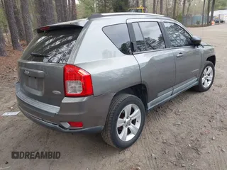 2011 Jeep Compass Latitude with VIN 1J4NF1FB5BD264825, listed as a IAAI auction lot 41935691 with 166,184 mi miles. Bid and sale history available at carsss.com. Image 4.