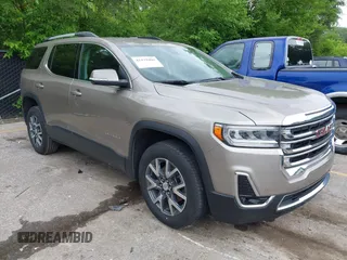 2023 GMC Acadia SLT z VIN 1GKKNUL41PZ184357, wystawiony jako IAAI lot #42439400 z przebiegiem 60 238 mil mil oraz . Historia ofert i sprzedaży dostępna na DreamBid. Obrazek 1.