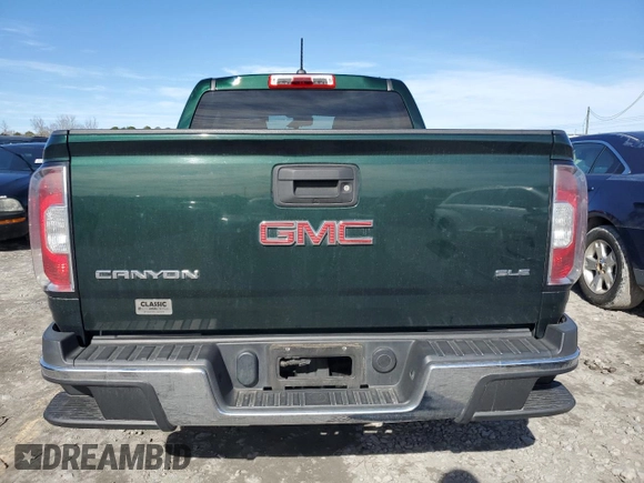 2015 GMC Canyon 2WD SLE with VIN 1GTG5BEA9F1139608, listed as a Copart auction lot 88911415 with 135,942 mi miles and Salvage Title. Bid and sale history available at carsss.com. Image 6.