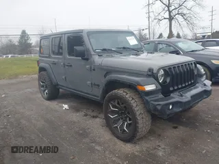 2020 Jeep Wrangler Unlimited Sport S with VIN 1C4HJXDG4LW266509, listed as a IAAI auction lot 41217142 with 73,569 mi miles and . Bid and sale history available at DreamBid. Image 1.