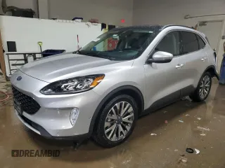 2020 Ford Escape Titanium Hybrid z VIN 1FMCU9DZ6LUB39475, wystawiony jako Copart lot #50159215 z przebiegiem 76 496 mil mil oraz Szkoda całkowita • Salvage title. Historia ofert i sprzedaży dostępna na DreamBid. Obrazek 1.